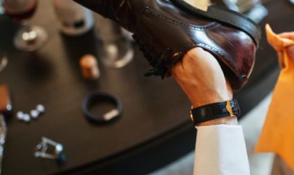 close-up-man-cleaning-shoes-while-getting-ready-wedding-ceremony